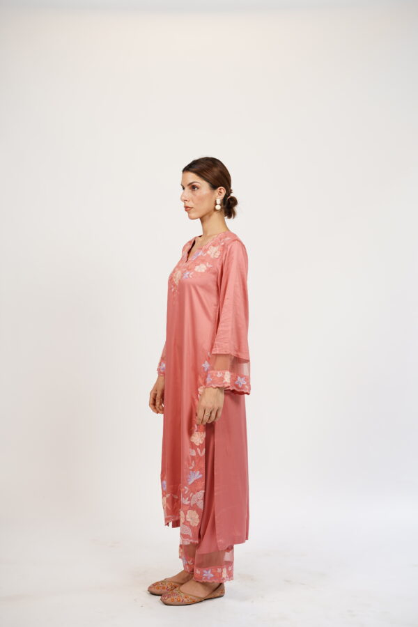 Side profile of the VaadiByLiza burnt peach floral kurta set with intricate Aari embroidery and flowing silhouette, perfect for any occasion.