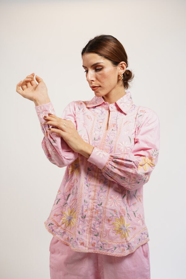 Side profile of VaadiByLiza’s Blossom Co-Ord set in pale pink, showcasing embroidered cuffs and floral detailing.